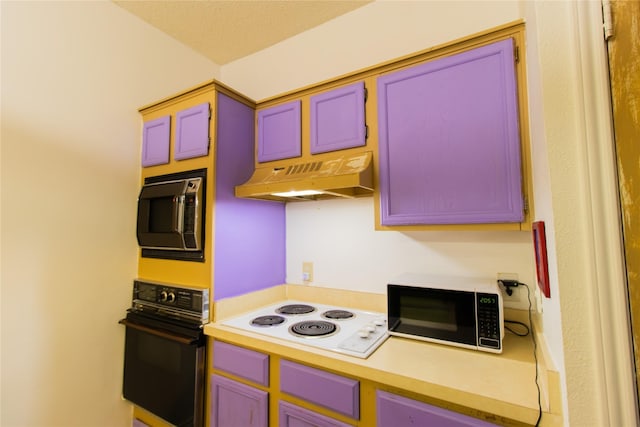 kitchen featuring a textured ceiling, oven, built in microwave, and white electric stovetop