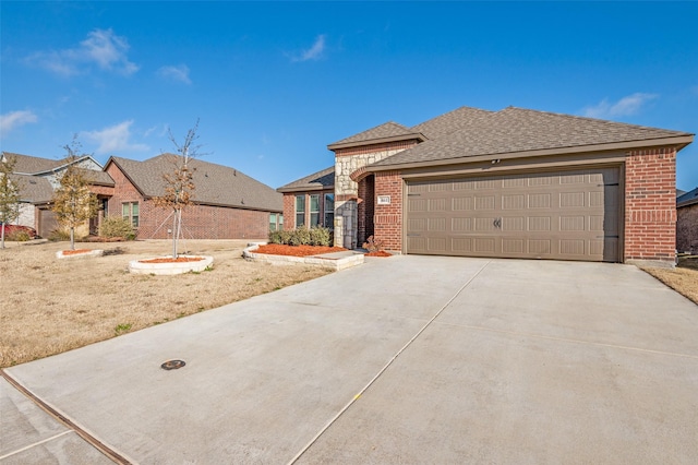 view of front of home with a garage