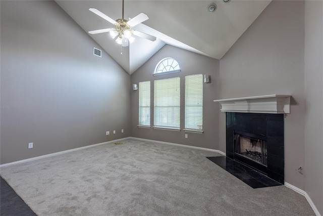 unfurnished living room with carpet flooring, ceiling fan, a fireplace, and lofted ceiling