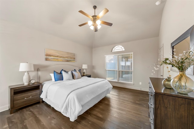 bedroom featuring ceiling fan, vaulted ceiling, and dark hardwood / wood-style floors