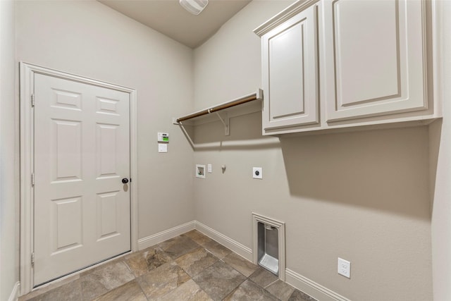 laundry room featuring gas dryer hookup, electric dryer hookup, washer hookup, and cabinets