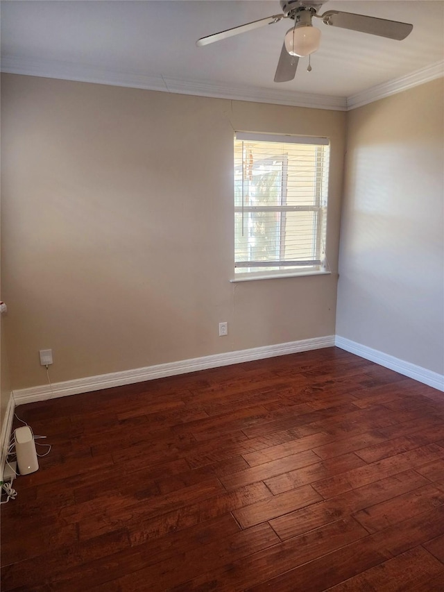 unfurnished room featuring ceiling fan, crown molding, and dark wood-type flooring