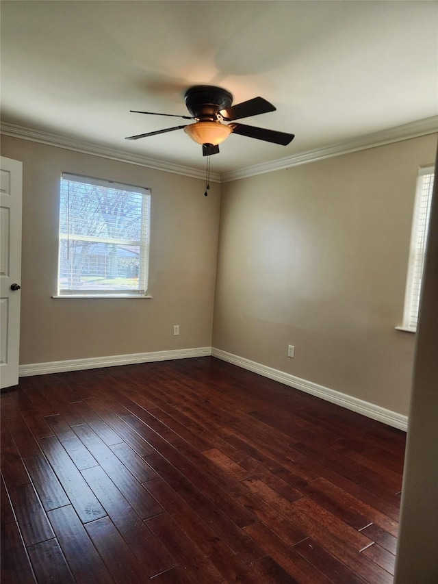 unfurnished room with dark hardwood / wood-style flooring, ornamental molding, and ceiling fan