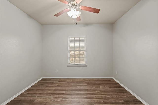 unfurnished room featuring ceiling fan and dark hardwood / wood-style flooring