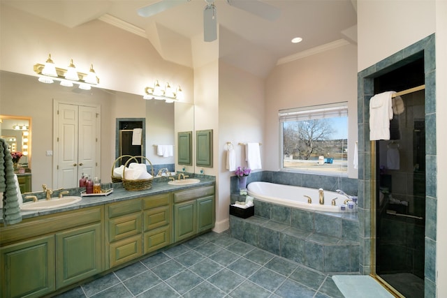 bathroom with tile patterned floors, ceiling fan, vanity, and plus walk in shower