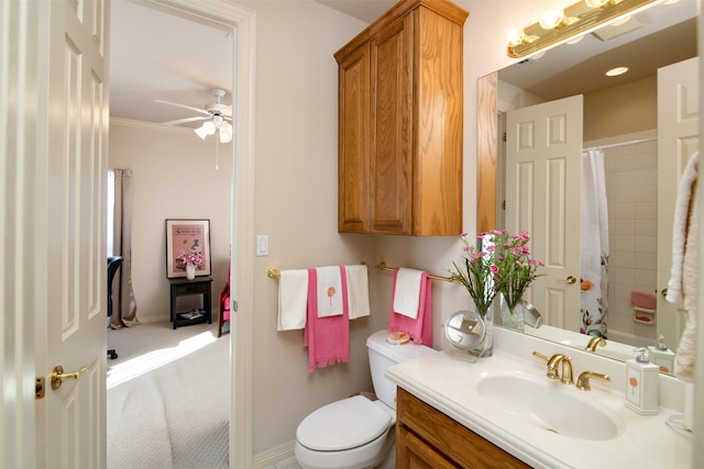 full bathroom with vanity, shower / bath combination with curtain, crown molding, ceiling fan, and toilet