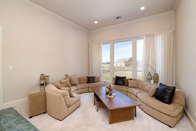 carpeted living room with ornamental molding