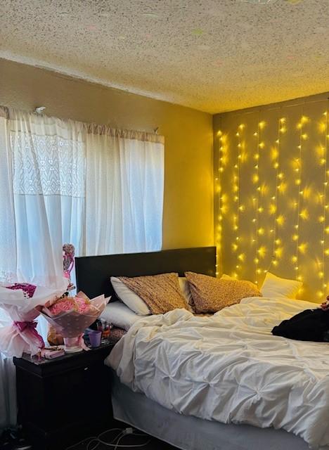 bedroom with a textured ceiling