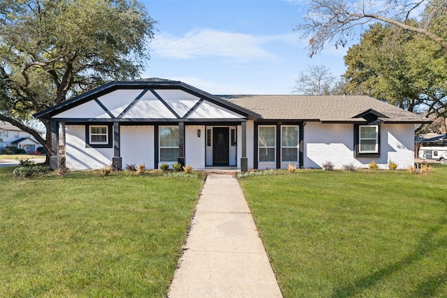 view of front of property with a front lawn