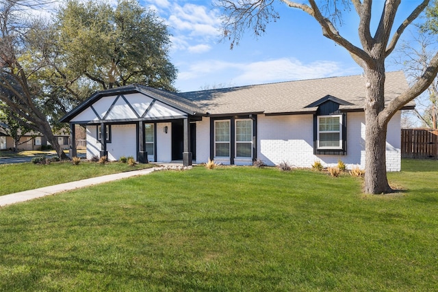 view of front of home with a front lawn