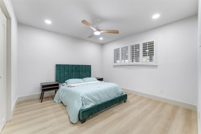 bedroom featuring recessed lighting, a ceiling fan, and wood finished floors
