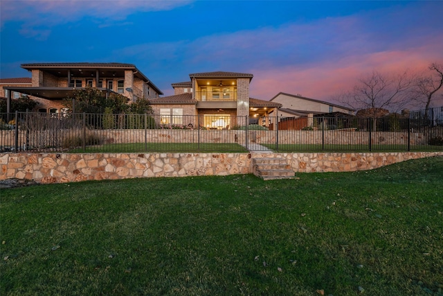 yard at dusk with a balcony