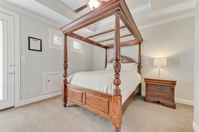 bedroom with ceiling fan, crown molding, and light carpet