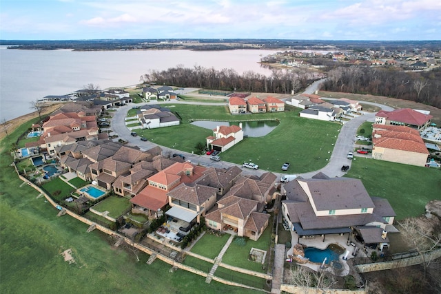 drone / aerial view featuring a water view