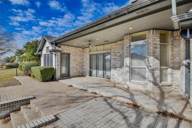 view of patio / terrace featuring ceiling fan