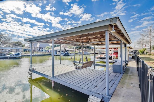 view of dock with a water view