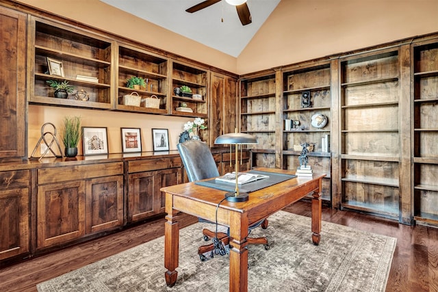 office area featuring ceiling fan, dark wood-type flooring, and vaulted ceiling