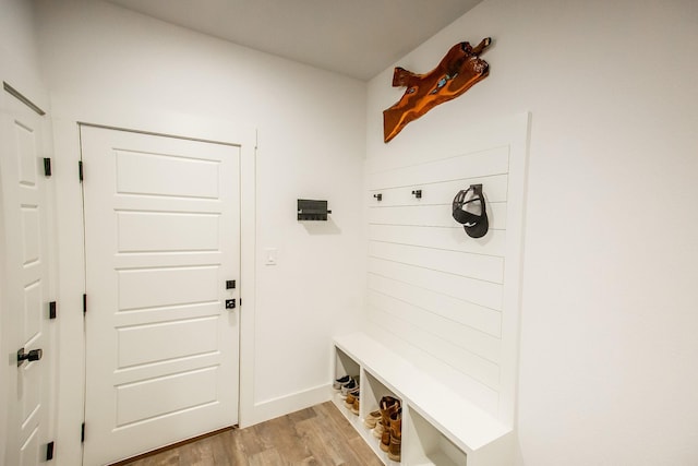 mudroom with light hardwood / wood-style flooring