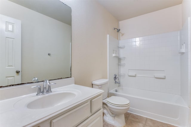 full bathroom with tile patterned floors, vanity, shower / bathtub combination, and toilet