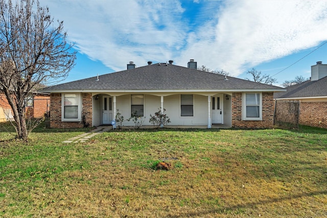 view of front of property with a front lawn