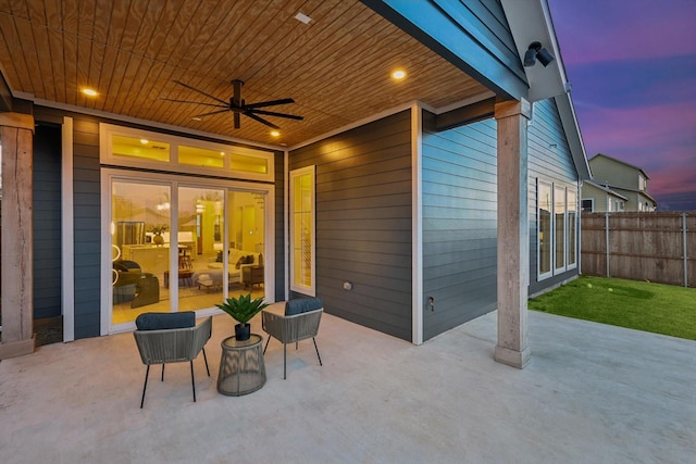 patio terrace at dusk with ceiling fan