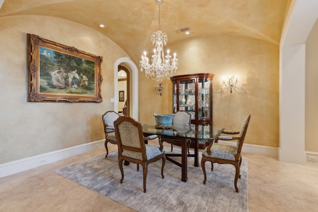 dining area with an inviting chandelier, vaulted ceiling, and brick ceiling