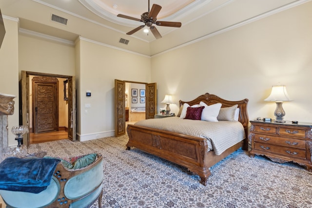 bedroom featuring light carpet, ceiling fan, and crown molding