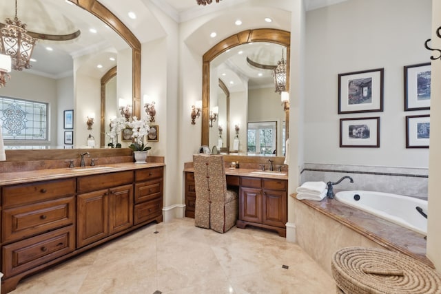 bathroom featuring vanity, ornamental molding, and tiled bath