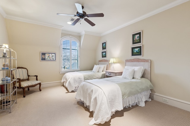 carpeted bedroom with ceiling fan and ornamental molding