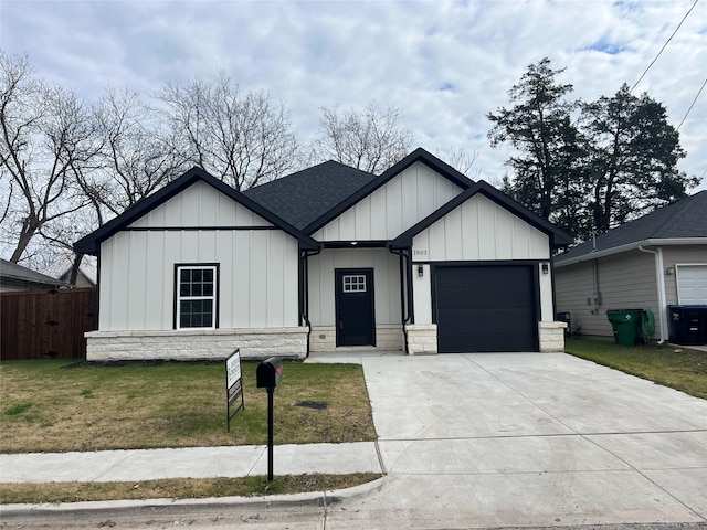 modern farmhouse style home with a front lawn and a garage