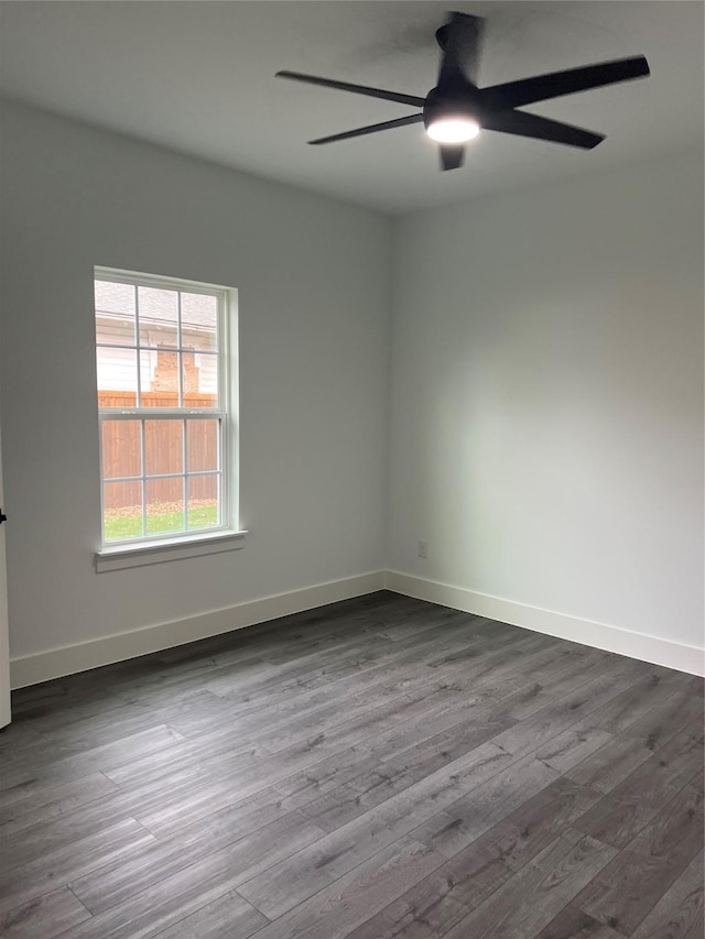 unfurnished room featuring ceiling fan and wood-type flooring