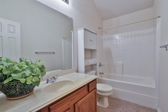 full bathroom with tile patterned floors, vanity, toilet, and tub / shower combination