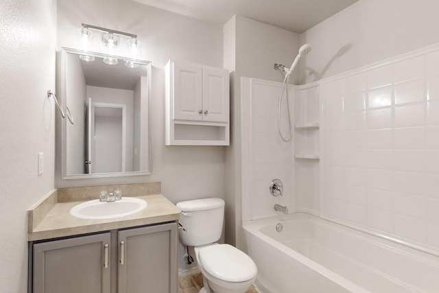 full bathroom featuring bathtub / shower combination, vanity, and toilet