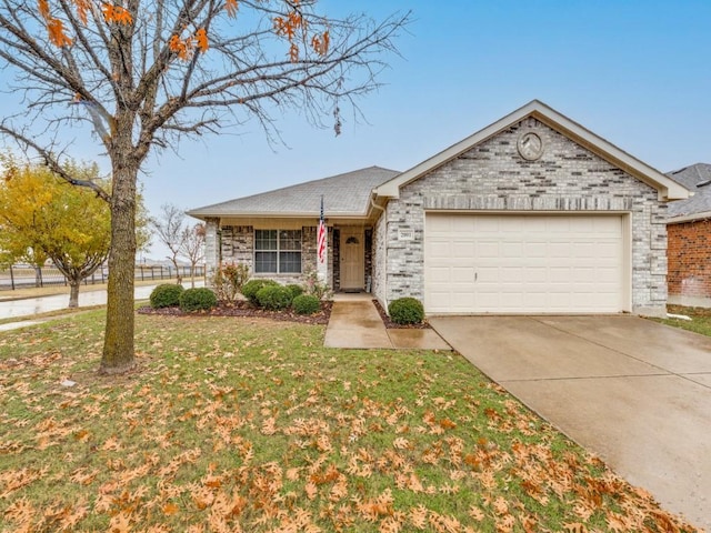 ranch-style house with a garage and a front lawn