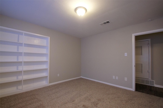 unfurnished bedroom with carpet flooring