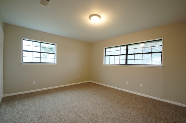 view of carpeted spare room