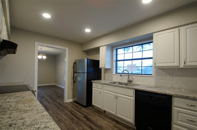 kitchen with stainless steel fridge, backsplash, sink, black dishwasher, and white cabinetry