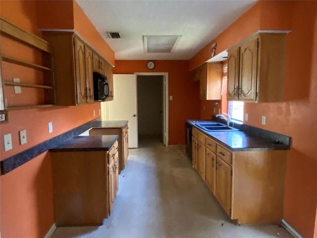 kitchen featuring sink and black appliances