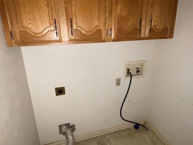 clothes washing area with cabinets, hookup for a washing machine, and electric dryer hookup