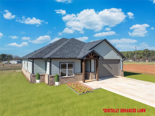 view of front of property with a garage and a front yard