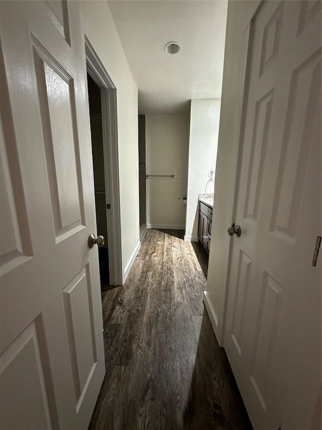 bathroom with hardwood / wood-style flooring