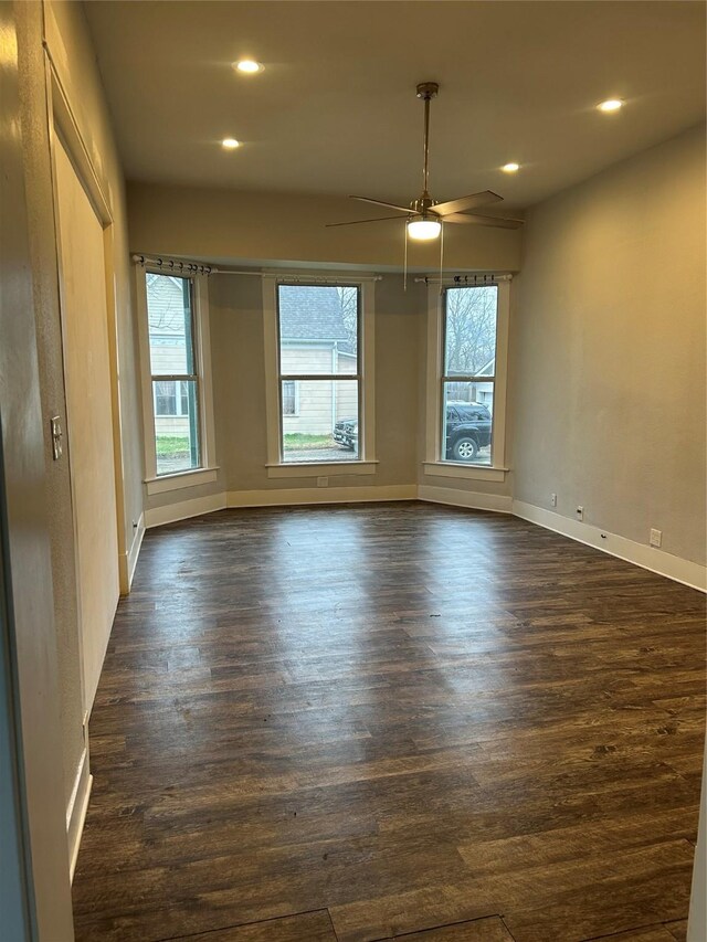 unfurnished dining area with dark hardwood / wood-style floors and a notable chandelier