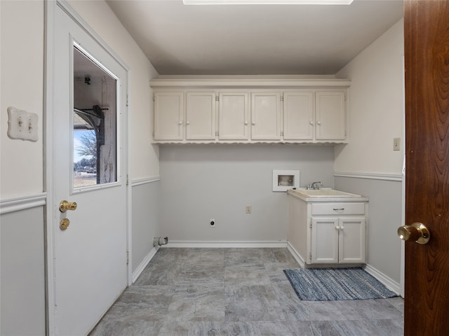 laundry room featuring hookup for an electric dryer, hookup for a washing machine, cabinets, and sink