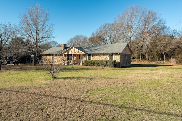 view of front of house with a front lawn