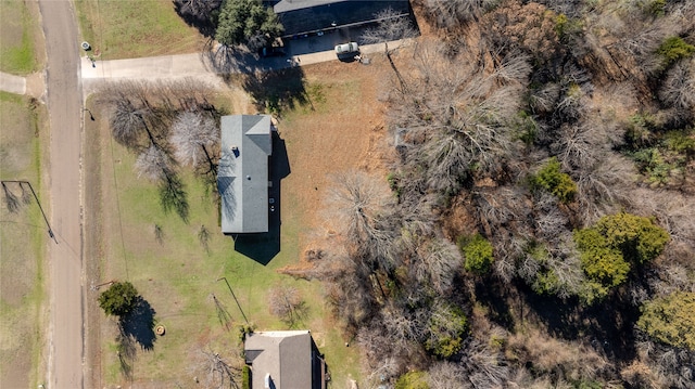 birds eye view of property featuring a rural view