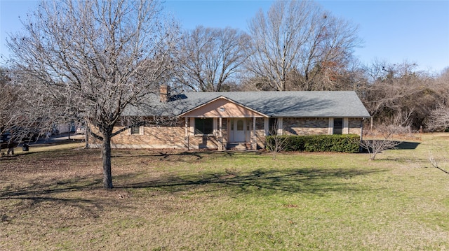 view of front of house featuring a porch and a front lawn