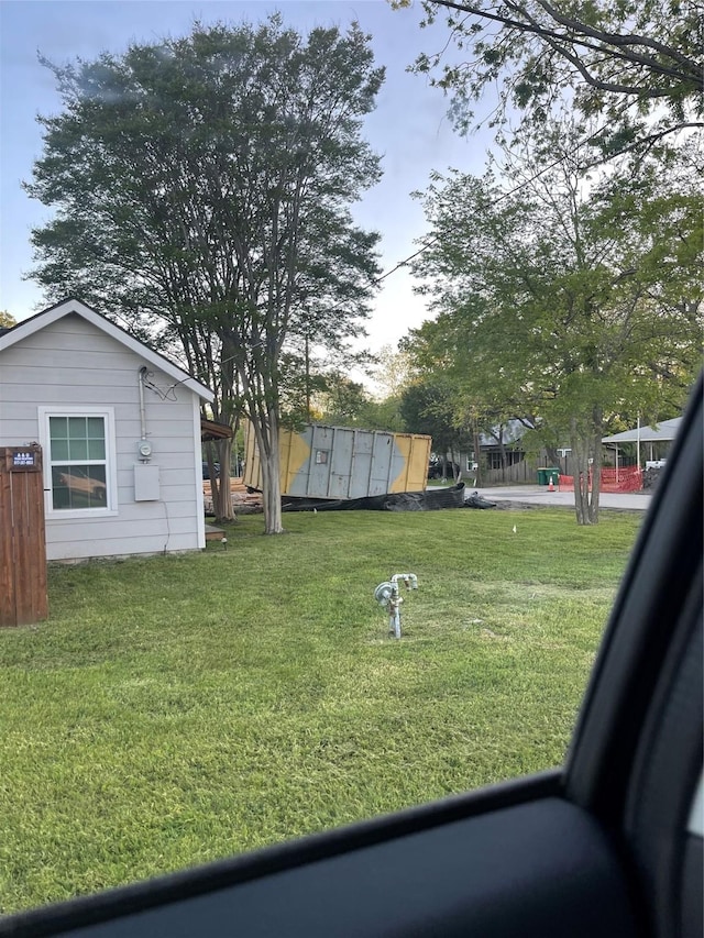 view of yard with mail area