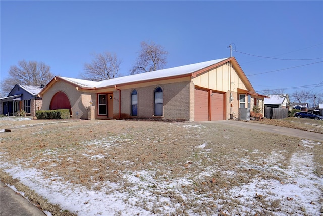 ranch-style house featuring a garage