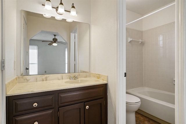 full bathroom featuring ceiling fan, toilet, shower / tub combination, and vanity