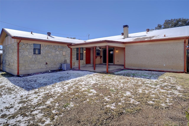 back of house with a patio and central AC unit